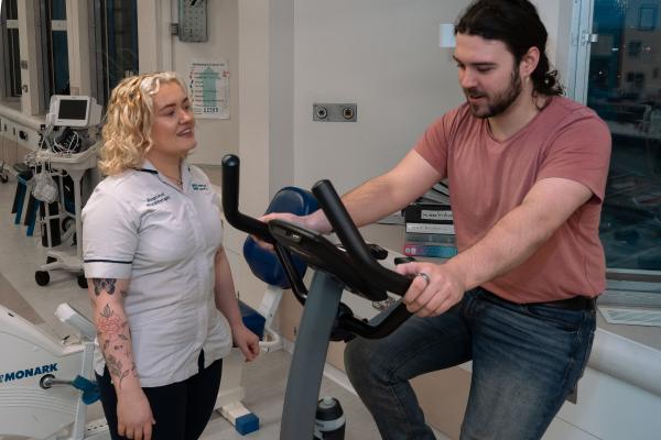 Harriet Mottershead with a patient (Pride in Practice article for Frontline Feb 2024)